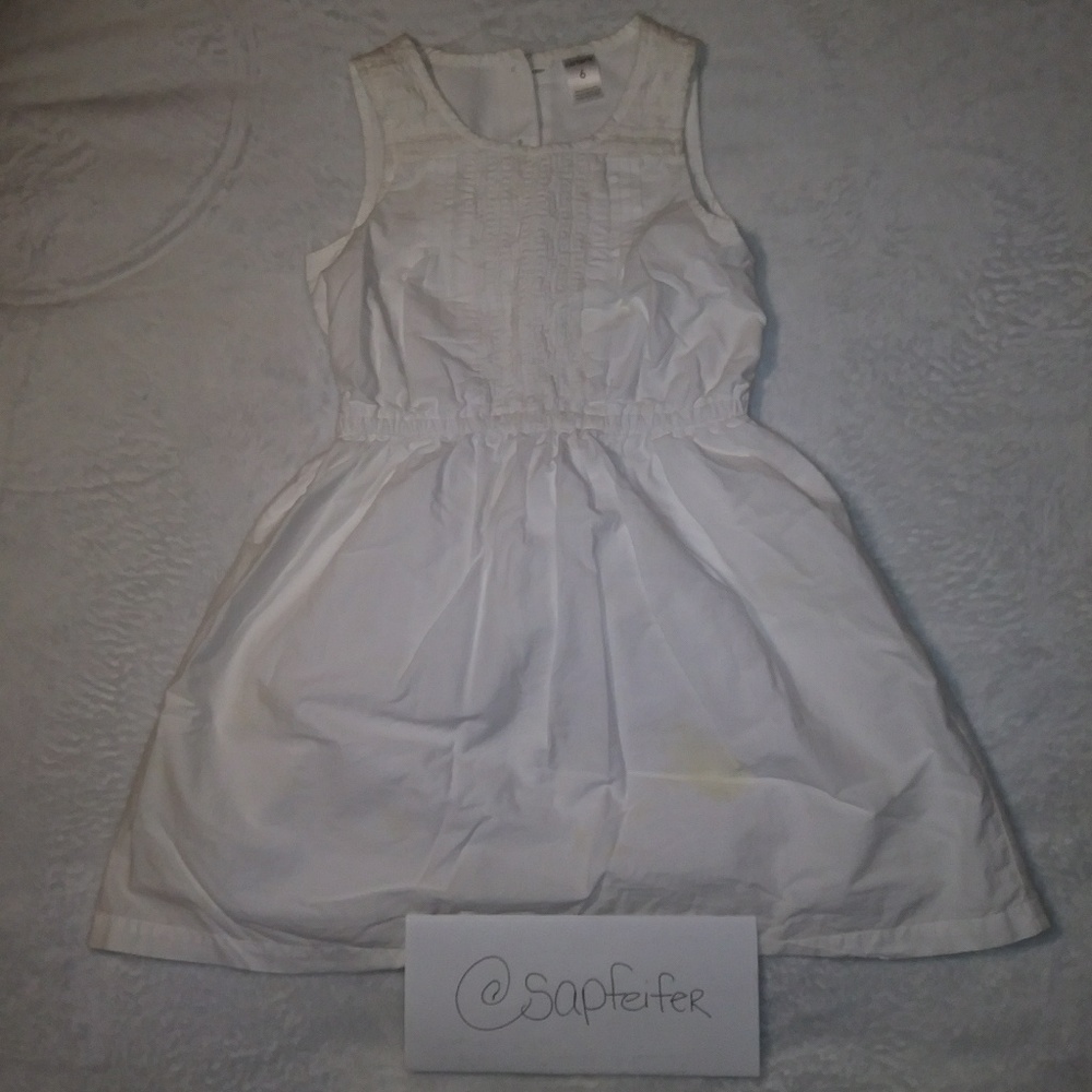All white dress.